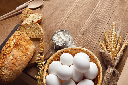 Baking Bread. Close Up Of Baking Ingredients And Products On Wood Table Still Life. High Resolution