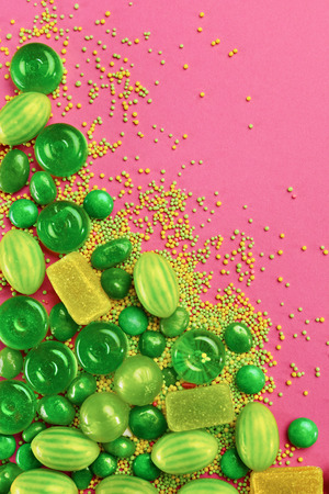 Candy And Sweets. Different Types Of Green And Yellow Sugar Candies On Background. High Resolutionの写真素材