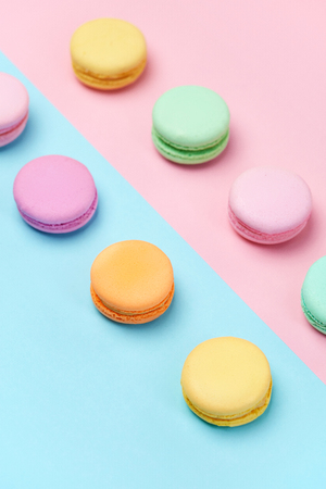 Sweets. Colorful Macaroons Pastel Blue Pink Background Close Up. High Resolutionの写真素材