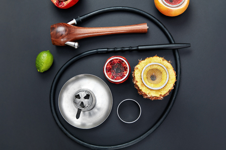 Shisha Hookah Details WIth Fruit Bowl On Black Background.の写真素材
