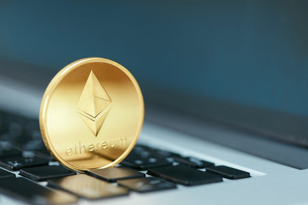 Cryptocurrency. Ethereum Coin On Computer Close Up. Digital Currency Symbol. High Resolution
