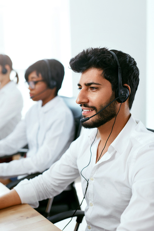 Operators Working On Hotline In Call-Center. Man Consulting Customers Online In Client Support Center. High Resolutionの写真素材