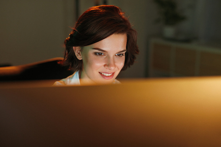 Female Programmer Writing Software On Computer. Woman Create Website In Office. High Resolutionの写真素材