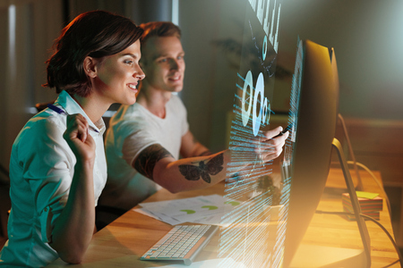 Programmers Writing Software For Website On Holographic Screen. Man And Woman Programming In Office. High Resolutionの写真素材