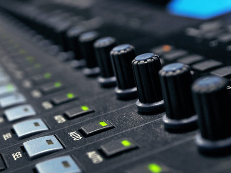 Music Mixer Control Panel In Professional Recording Studio. Closeup Of Sound Mixing Desk. High...