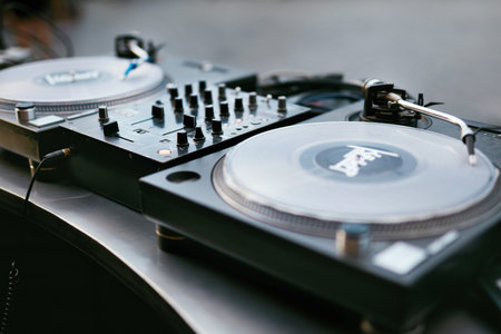 DJ Equipment On Table Closeup. DJ Control Panel For Playing Music. High Resolution