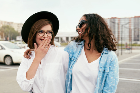 Beautiful Young Women In Casual Clothes Having Fun Outdoors, Smiling Friends At Street. High Resolutionの写真素材