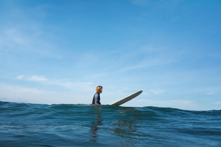Surf In Ocean. Surfer On Surfboard Swimming In Sea. Surfing As Active Lifestyle. Blue Water And...