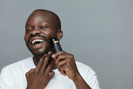 Shaving Routine For Male. Electric Razor Shaver Tool For Beard. Man Removes Facial Hair. Skincare...