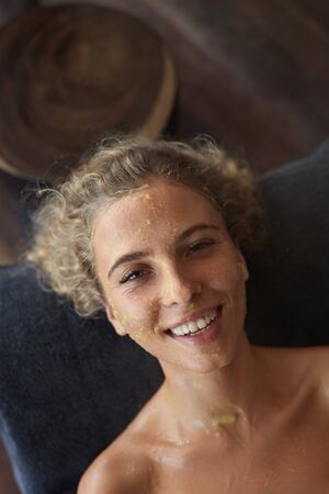 Spa Face Mask. Skin Care Beauty Treatment. Relaxed Woman On Natural Cosmetics Facial Procedure.の写真素材