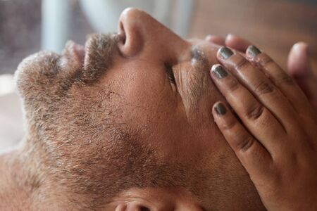 Spa Face Massage. Skin Care Beauty Treatment. Relaxed Man On Natural Cosmetic Facial Procedure. Rejuvenation Therapy.の写真素材