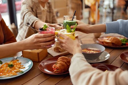 Lunch In Cafe. Cheering With Cocktails. Women Having Fun. Friends Meeting In Restaurant As Part Of Lifestyle.の写真素材