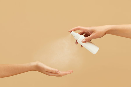 Hygiene. Female Hands Using Spray Antiseptic To Stop Spreading Of Coronavirus. Daily Routine With...