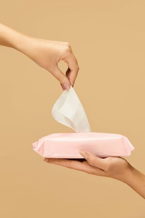 Wet Wipes. Hand Picked Napkin From Pink Pack To Stop COVID-19. Daily Hygiene For Virus And Bacterial Infection Prevention.の写真素材