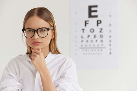 Visual Health. Female With Beautiful Face At Ophthalmologist Officeの写真素材