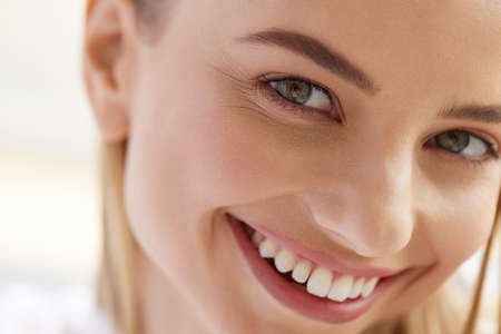 Woman Smile. Happy Girl With White Teeth Smiling At Cameraの写真素材