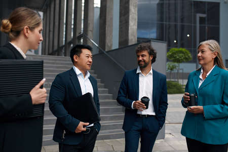 Business Partners Discussing Project Together. People During the Breakの写真素材