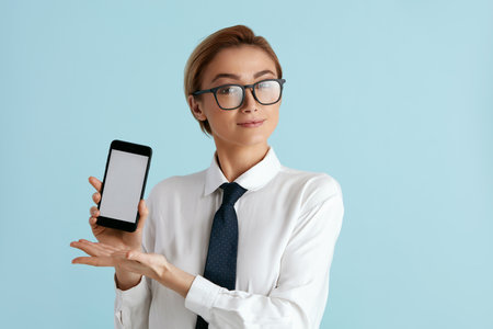 Happy Businesswoman Showing Smartphone. Caucasian Lady Recommended Appの写真素材