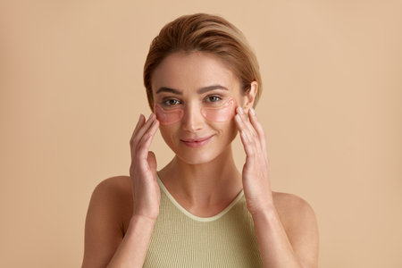 Eye Skin Beauty. Woman Posing With Collagen Hydrogel Eye Patches Under Eyesの写真素材