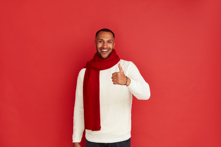 Happy Man Thumbs Up. Multiracial Man Smiling and Gesturingの写真素材