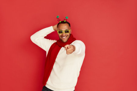 Multiracial Man Dancing Isolated. Portrait of Ecstatic Overjoyed Guy Dancingの写真素材