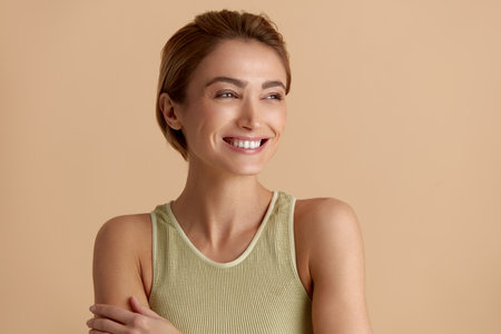 Beauty Woman Posing Isolated Portrait. Blonde Woman Model With Smooth Skinの写真素材