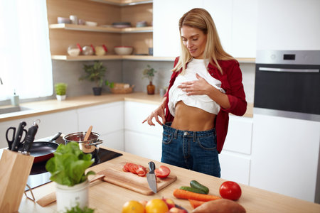 Diet Woman Showing How Much Weight She Lost. Cropped View Of Diet Ladyの写真素材