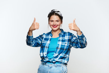 Smiling Woman Showing Big Fingers Isolated. Happy Plus Size Girl Looking Cameraの写真素材