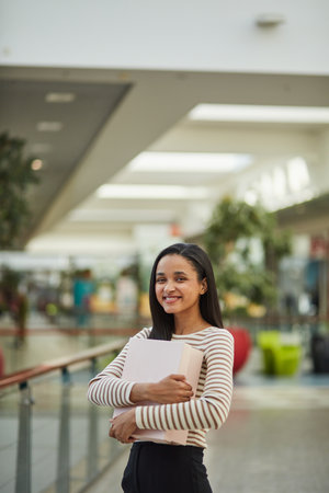 Happy Businesswoman Enjoying Weekend Shopping Spree at Mallの写真素材