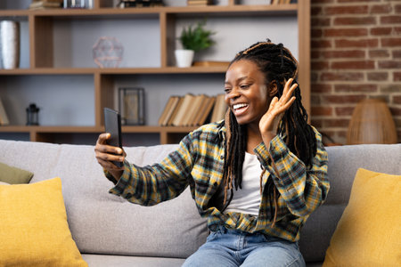 Woman Enjoying a Video Call From Homeの写真素材