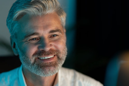 Happy Mature Man Smiling with Gray Hair and Beard in Close-Up
