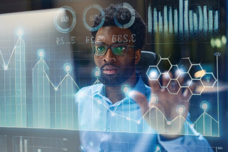 Businessman Analyzing Interactive Data Visualizations on Advanced Digital Interface Screenの写真素材