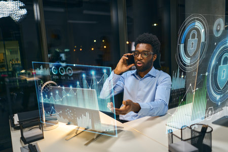 Business Professional Discussing Digital Analytics and Cybersecurity in Futuristic Officeの写真素材