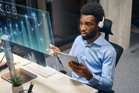 Professional Analyst Monitoring Digital Data With Modern Interface in a Business Officeの写真素材