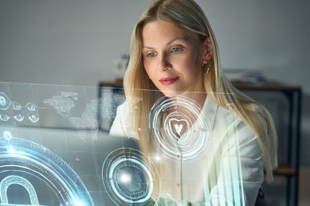 Woman Working With Futuristic Technology Holographic Display in Modern Office Environment