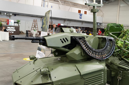 Unmanned strike tank. Close-up of a combat module with a cannon unmanned wheeled vehicle at the...