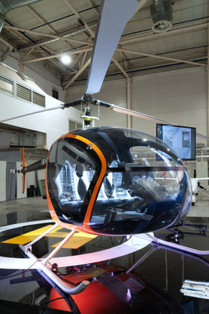 Light helicopter. Small light helicopter on display at the international exhibition ARMS AND SECURITY - 2021. Kiev. Ukraine - June 18, 2021.のeditorial素材