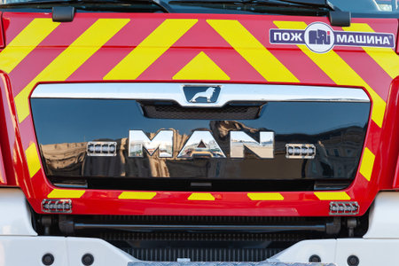 Emblem of the fire truck Man of the rescue service of Ukraine. Exhibition of technology in Kiev....