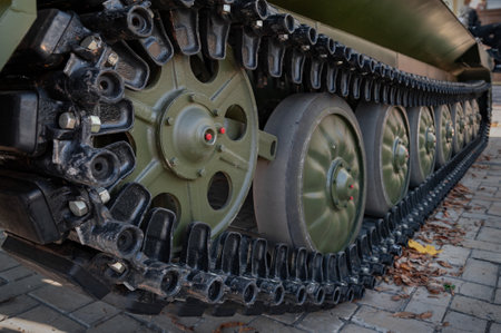 Close-up of the tracks of a Ukrainian army tank. Exhibition of military equipment in Kiev. Modern military technology. Ukraine. Kiev. October 15, 2021のeditorial素材