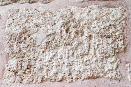 Stone masonry. Ancient stone limestone wall. Vintage texture. Selective focus.の写真素材