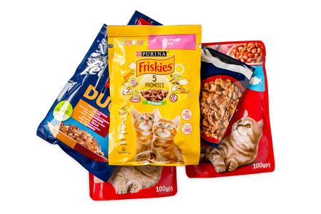 cat food. Animal feed in colored bags isolated on white background. Kyiv. Ukraine. April 25, 2022のeditorial素材