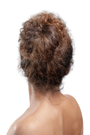 Back view of young woman. Nude young brunette white woman. dark hair. isolated on white backgroundの写真素材