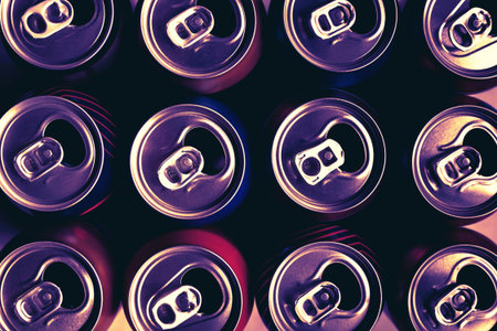 Beer cans. Aluminum cans. Top view of many empty cans. Recycling and recycling. creative tone....