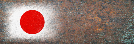 Flag of Japan. Flag painted on rusty surface. Rusty background. copyspace. textured creative backgroundの写真素材