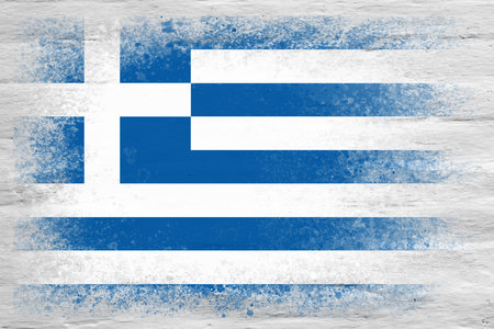 Flag of Greece. Flag painted on a white plastered brick wall. brick background. copyspace. textured creative backgroundの写真素材