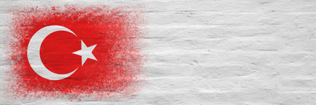 Flag of Turkey. Flag painted on a white plastered brick wall. brick background. copyspace. textured creative backgroundの写真素材