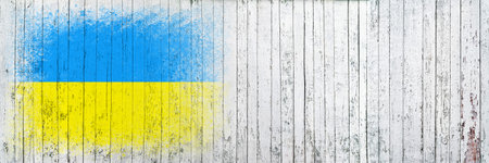 Flag of Ukraine. Flag is painted on a white wooden surface. wooden background. Plywood surface. copyspace. textured creative backgroundの写真素材