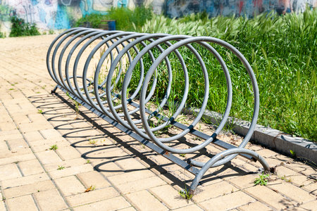 Parking space for bicycles. metal frame for bikes. selective soft focusの写真素材