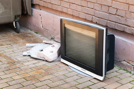 Old TV is thrown into a street dump. selective soft focusの写真素材