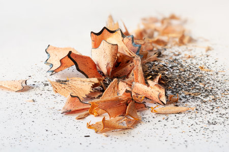 Pencil shavings. Wooden pencil shavings. sharpening debris. wooden wasteの写真素材